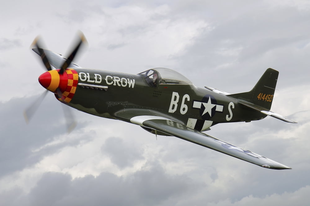 A North American P-51 Mustang in flight over Vasteras Sweden Canvas Art - Daniel KarlssonStocktrek Images (35 x 23)