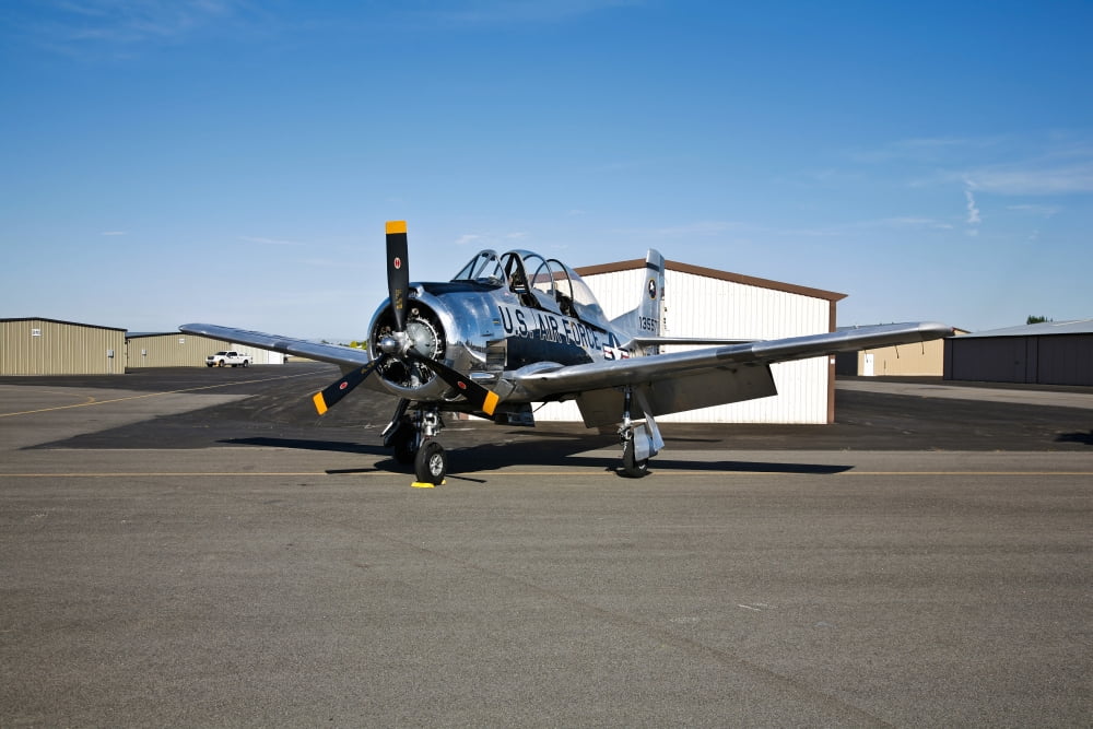 A North American T-28 Trojan military trainer aircraft Canvas Art - Scott GermainStocktrek Images (18 x 12)