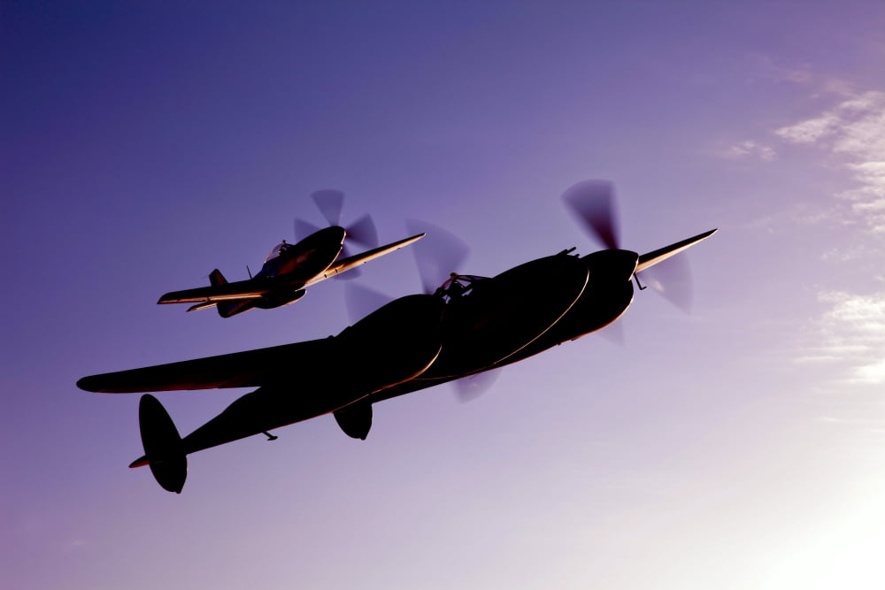 A P-38 Lightning and P-51D Mustang in flight Canvas Art - Scott GermainStocktrek Images (18 x 12)