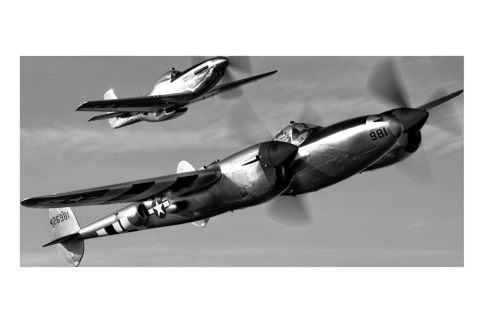 A P-38 Lightning and P-51D Mustang in flight Canvas Art - Scott GermainStocktrek Images (18 x 12)