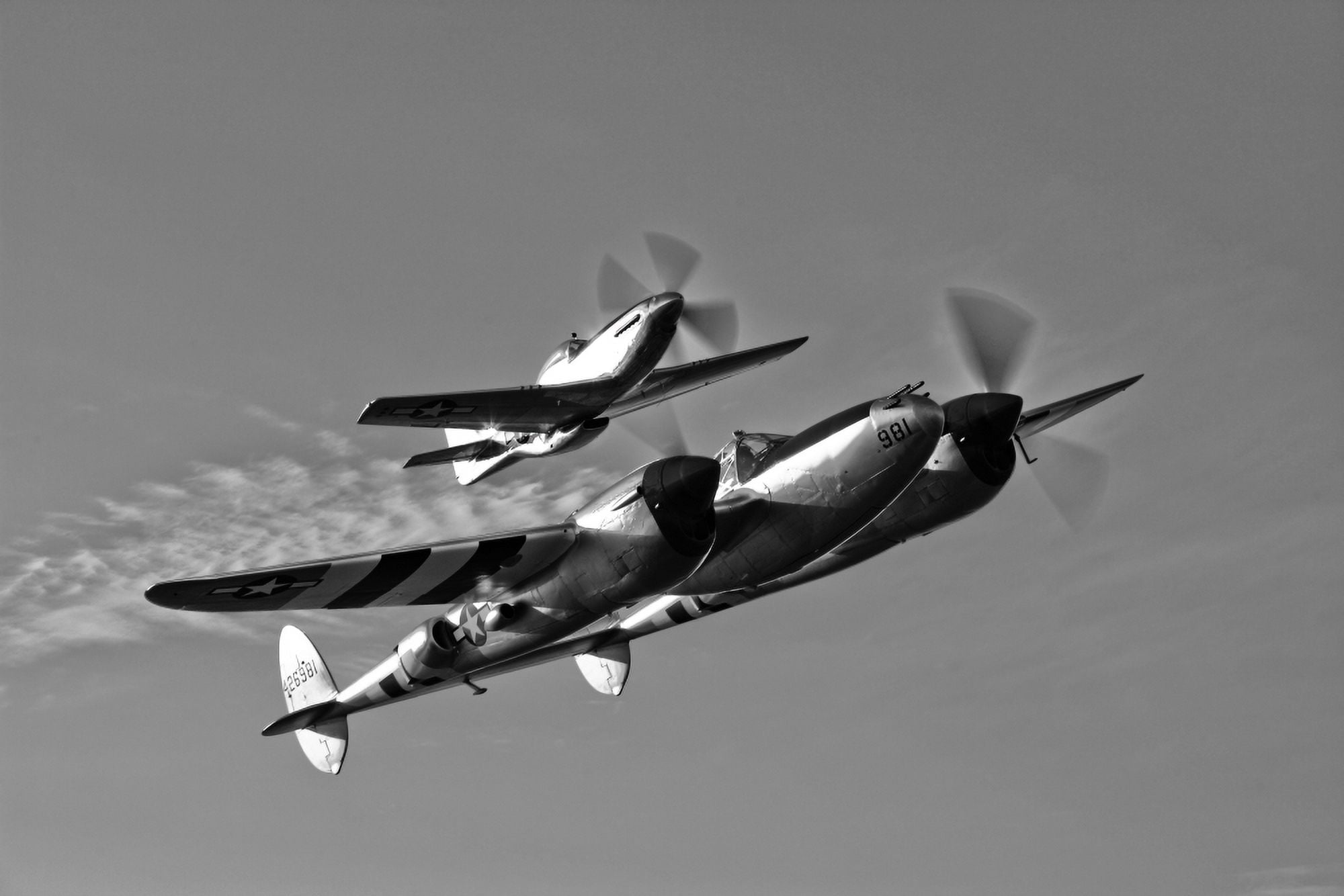 A P-38 Lightning and P-51D Mustang in flight Canvas Art - Scott GermainStocktrek Images (18 x 12)
