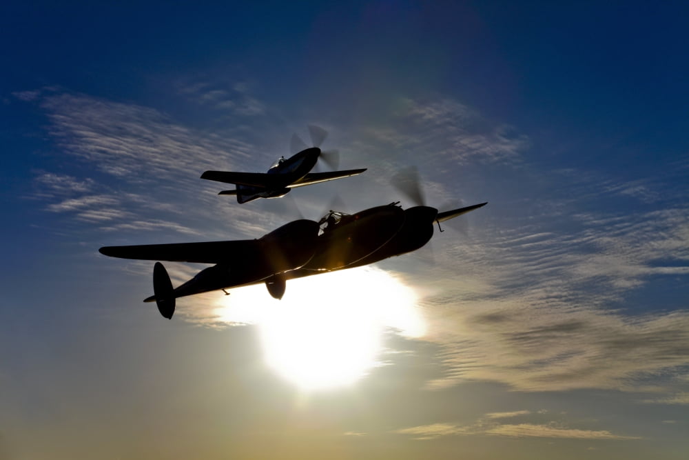 A P-38 Lightning and P-51D Mustang in flight Canvas Art - Scott GermainStocktrek Images (18 x 12)