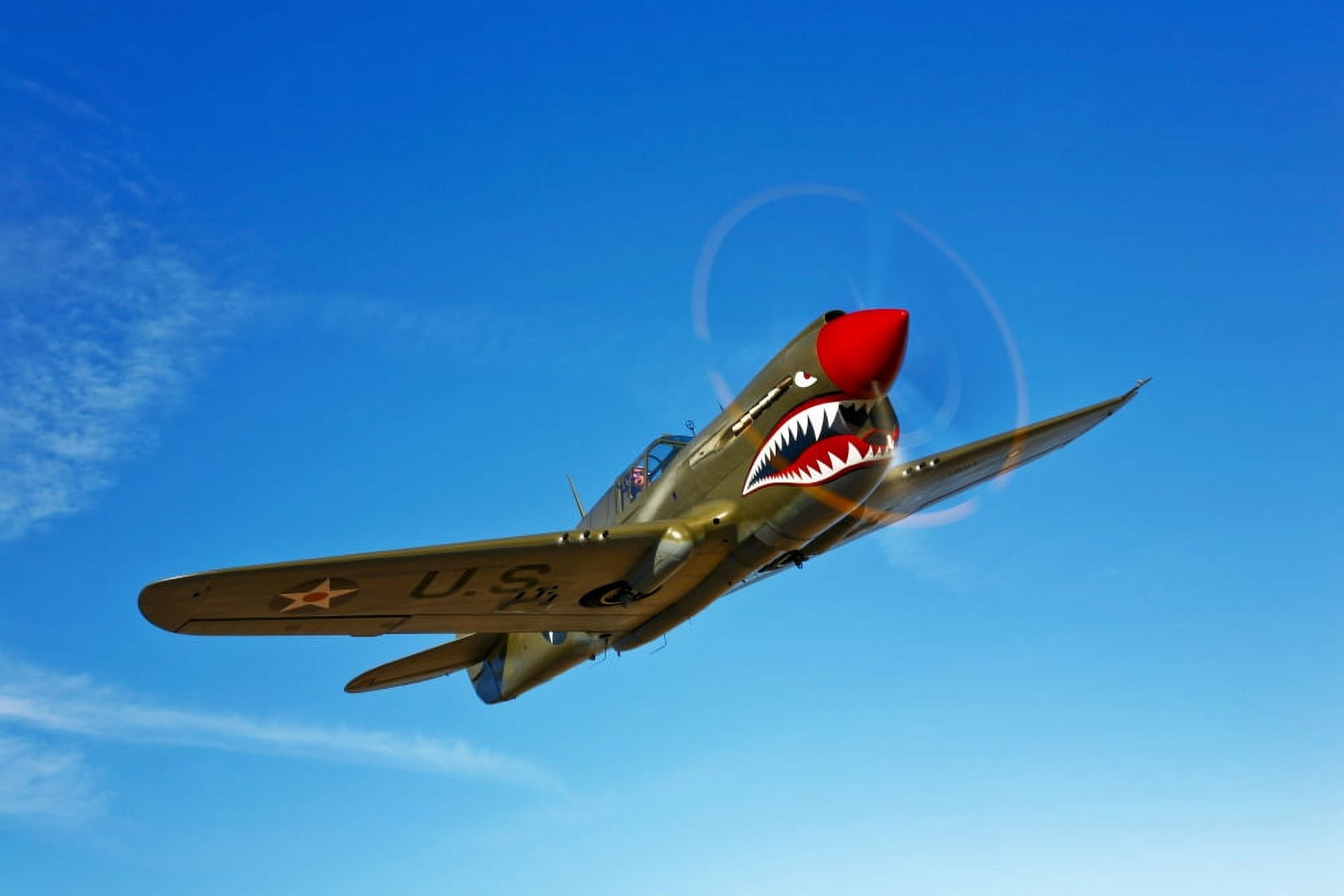 A P-40E Warhawk in flight Canvas Art - Scott GermainStocktrek Images (35 x 23)