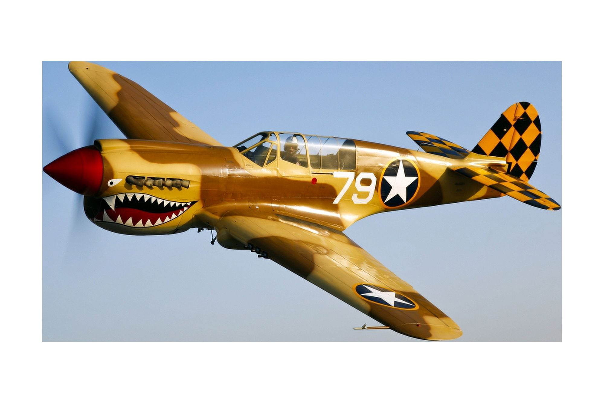 A P-40N Warhawk in flight Canvas Art - Scott GermainStocktrek Images (35 x 23)