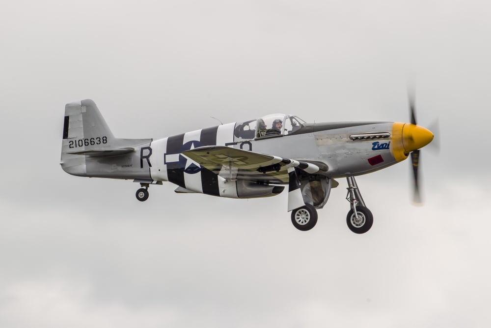 A P-51 Mustang flies by at Everett Washington Canvas Art - Rob EdgcumbeStocktrek Images (34 x 23)