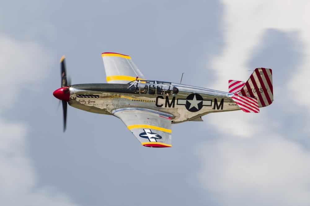 A P-51 Mustang flies by at Waukegan Illinois Canvas Art - Rob EdgcumbeStocktrek Images (17 x 12)