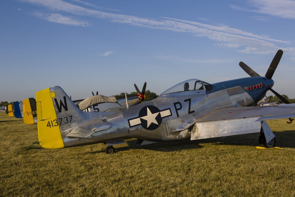 A P-51 Mustang parked at EAA Airventure Oshkosh Wisconsin Canvas Art - Rob EdgcumbeStocktrek Images (17 x 12)