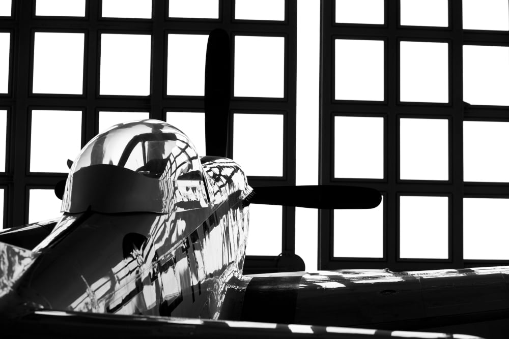 A P-51 Mustang parked in an aircraft hangar Canvas Art - Timm ZiegenthalerStocktrek Images (18 x 12)