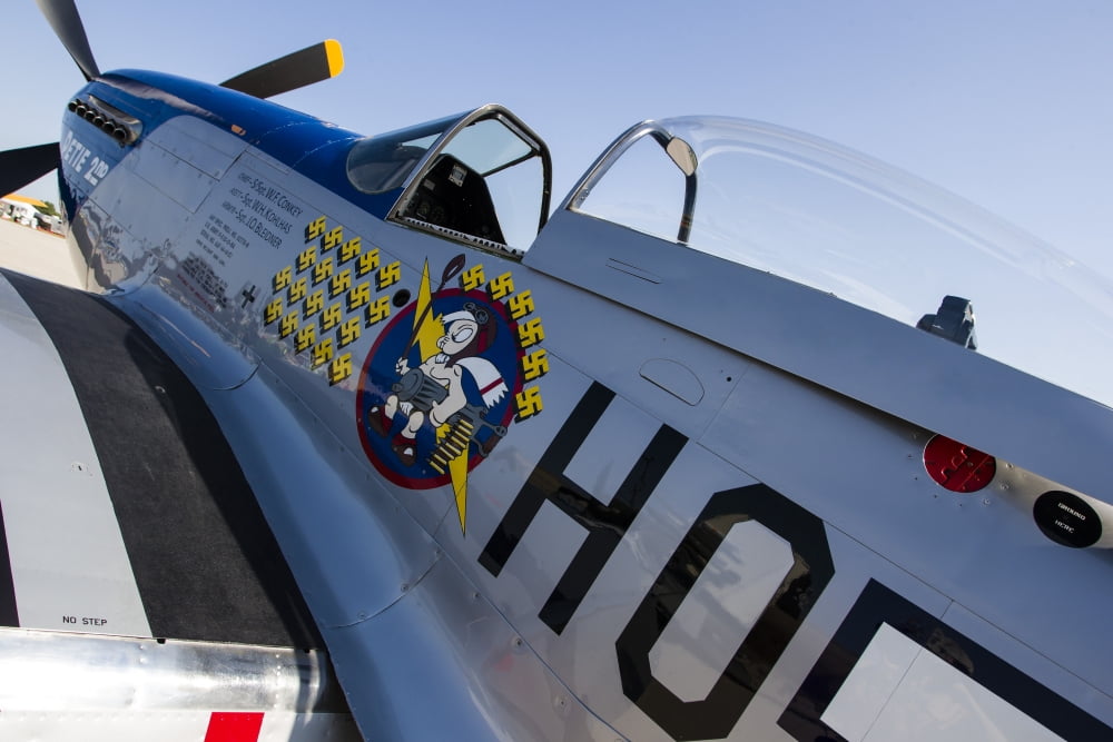 A P-51 Mustang parked on the ramp at Waukesha Wisconsin Canvas Art - Rob EdgcumbeStocktrek Images (17 x 12)