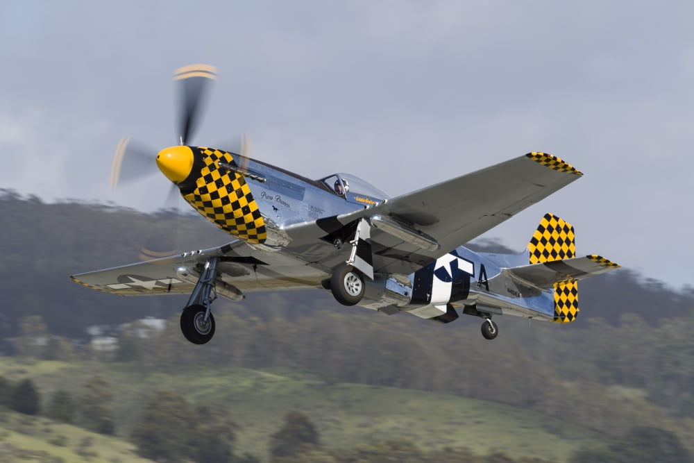 A P-51 Mustang takes off from Half Moon Bay California Canvas Art - Rob EdgcumbeStocktrek Images (17 x 12)
