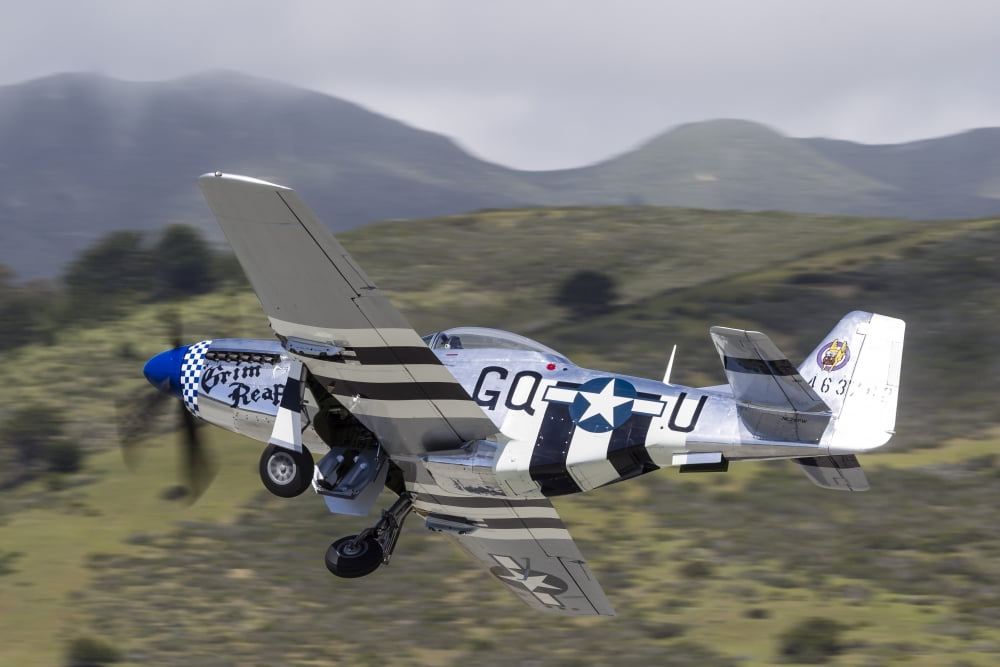 A P-51 Mustang takes off from Half Moon Bay California Canvas Art - Rob EdgcumbeStocktrek Images (17 x 12)