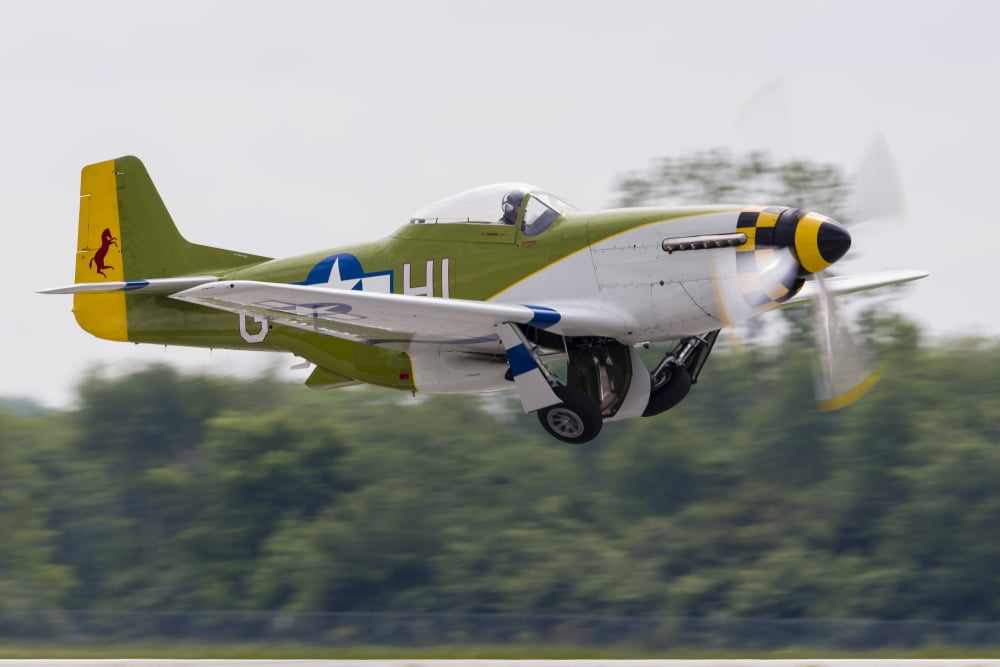 A P-51 Mustang takes off from Mount Comfort Indiana Canvas Art - Rob EdgcumbeStocktrek Images (34 x 23)