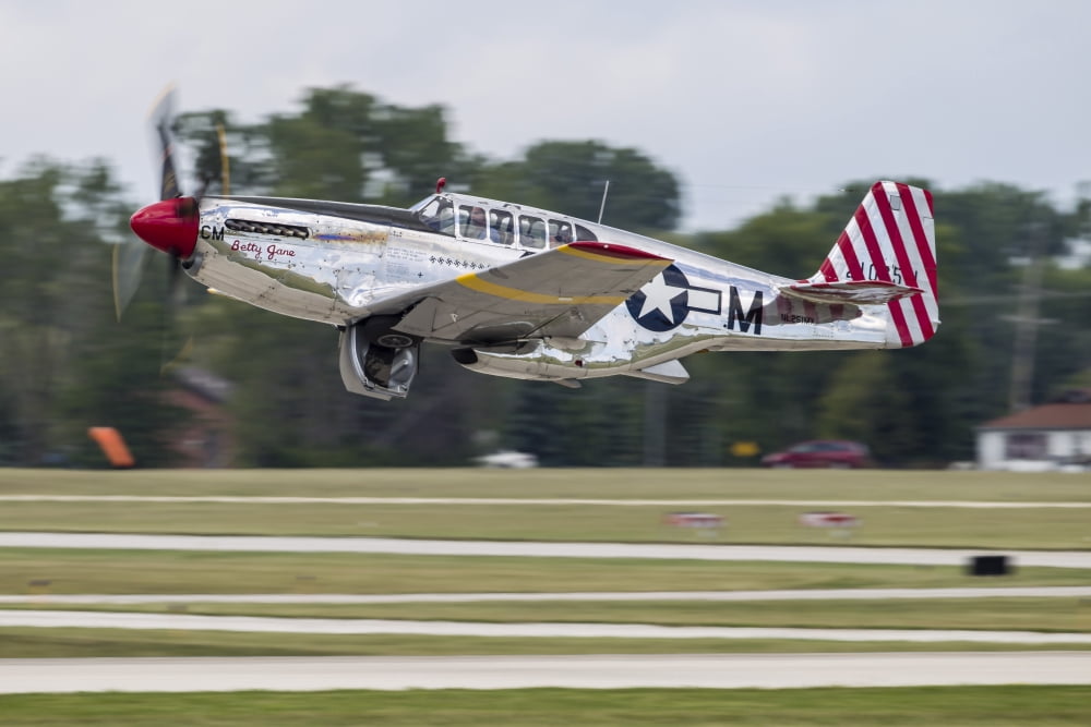 A P-51 Mustang takes off from Waukegan Illinois Canvas Art - Rob EdgcumbeStocktrek Images (17 x 12)