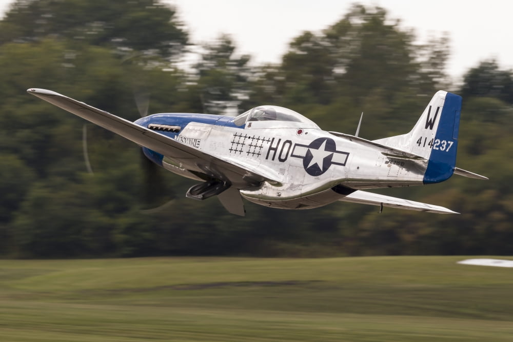 A P-51 Mustang takes off from Waukegan Illinois Canvas Art - Rob EdgcumbeStocktrek Images (34 x 23)