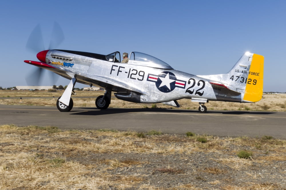 A P-51 Mustang taxiing at Vacaville California Canvas Art - Rob EdgcumbeStocktrek Images (34 x 23)