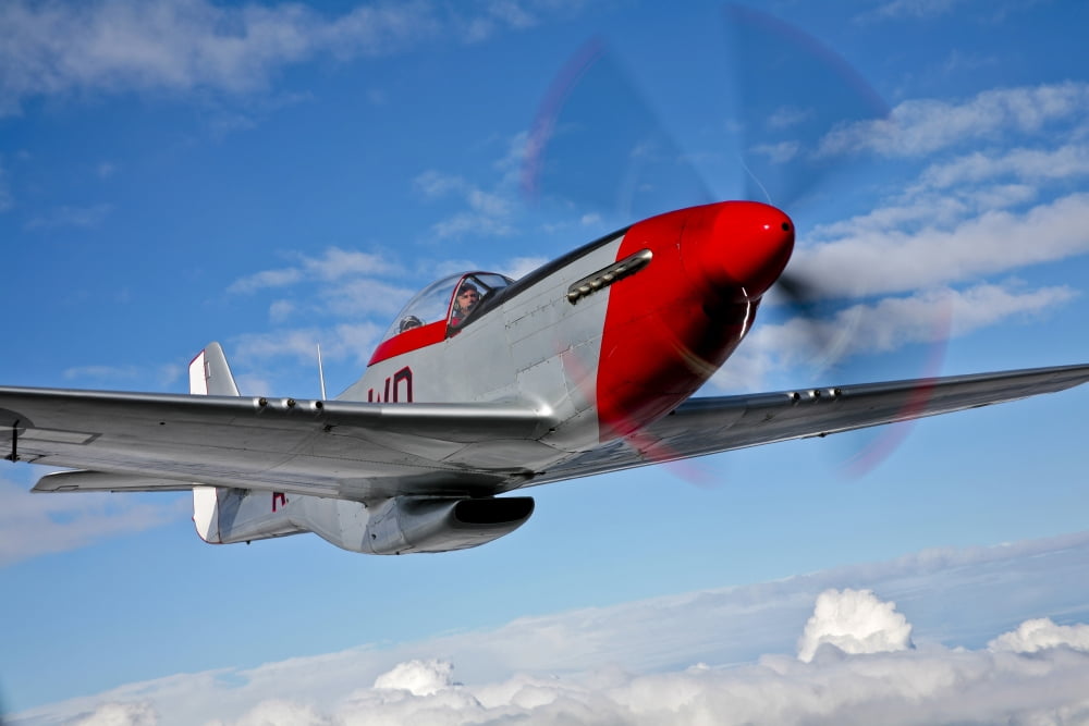 A P-51D Mustang in flight near Hollister California Canvas Art - Scott GermainStocktrek Images (18 x 12)