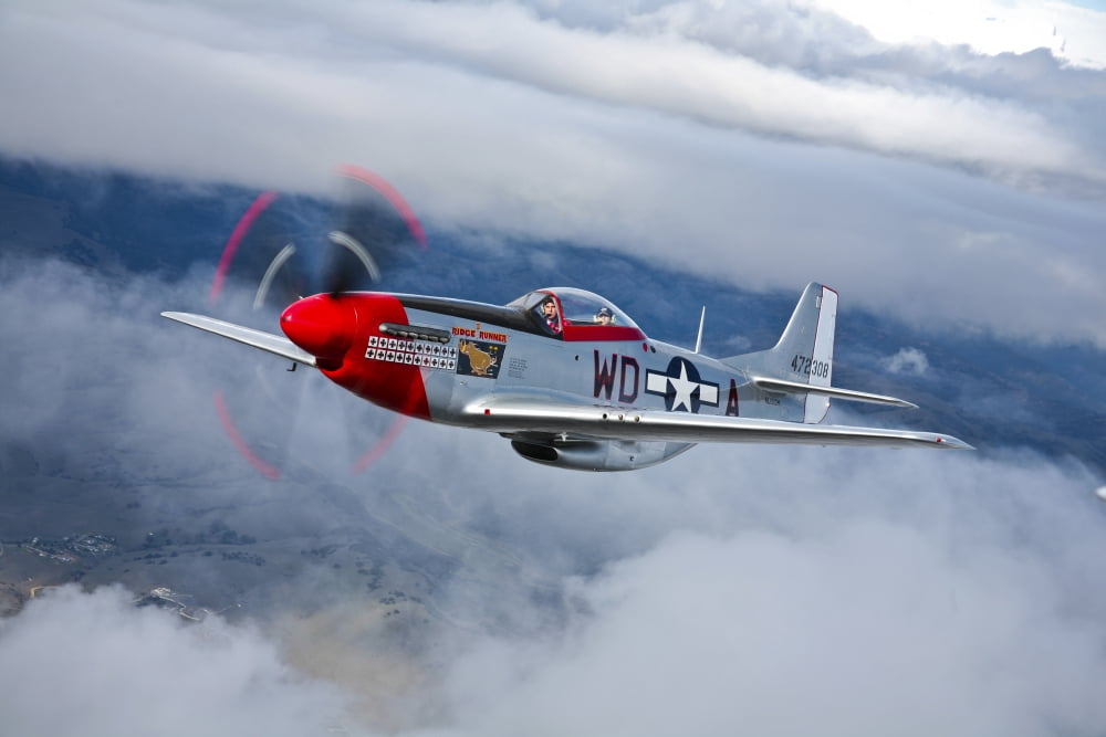 A P-51D Mustang in flight near Hollister California Canvas Art - Scott GermainStocktrek Images (35 x 23)