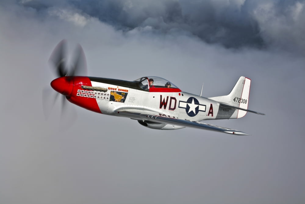 A P-51D Mustang in flight near Hollister California Canvas Art - Scott GermainStocktrek Images (35 x 23)