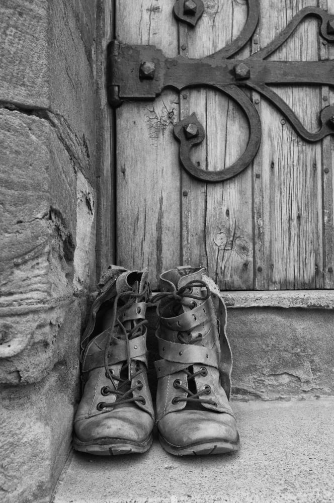 A Pair Of Worn Boots Outside A Door Northumberland England Canvas Art - John Short Design Pics (24 x 38)
