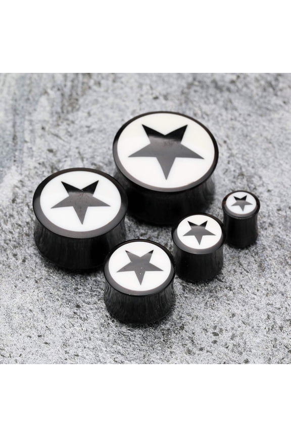 A Pair of Organic Horn Nova Star Ear Gauge Plug