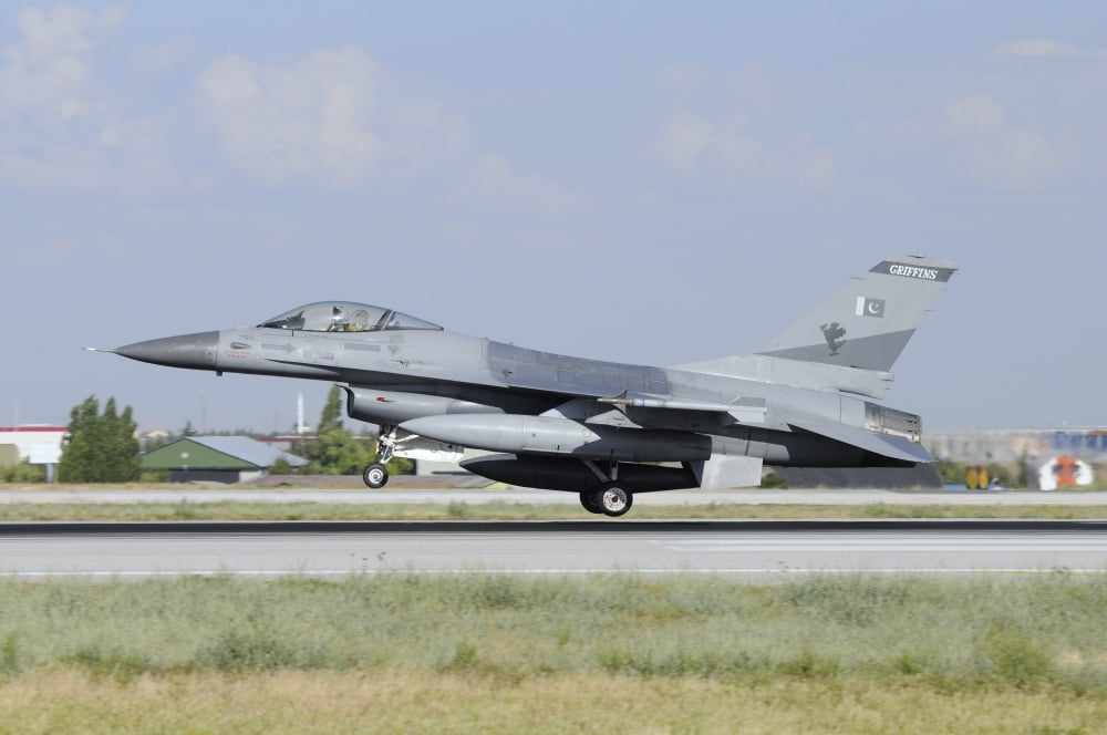 A Pakistan Air Force F-16A landing at Konya Air Base Turkey Canvas Art - Riccardo NiccoliStocktrek Images (17 x 12)
