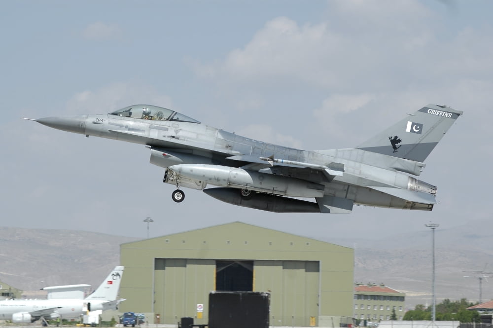 A Pakistan Air Force F-16A taking off from Konya Air Base Turkey Canvas Art - Riccardo NiccoliStocktrek Images (34 x 23)