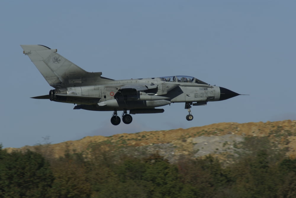 A Panavia Tornado of the Italian Armed Force over Florennes Belgium Canvas Art - Ramon Van OpdorpStocktrek Images (35 x 23)