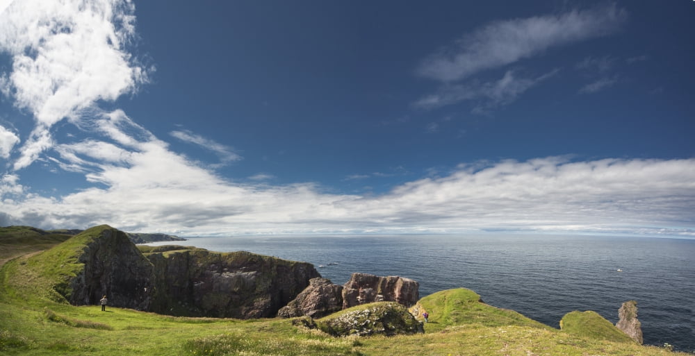 A Person Stands Looking At The Rocky Promontory At St Abbs Head Scottish Borders Scotland Canvas Art - John Short Design Pics (42 x 22)
