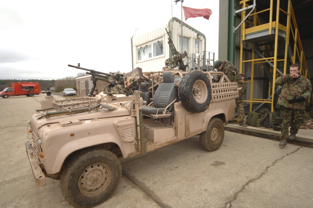 A Pink Panther Land Rover of the British Army Canvas Art - Andrew ChittockStocktrek Images (34 x 23)