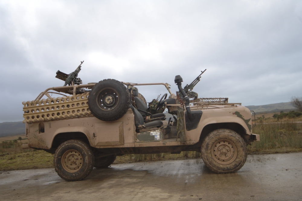 A Pink Panther Land Rover of the British Army Canvas Art - Andrew ChittockStocktrek Images (34 x 23)