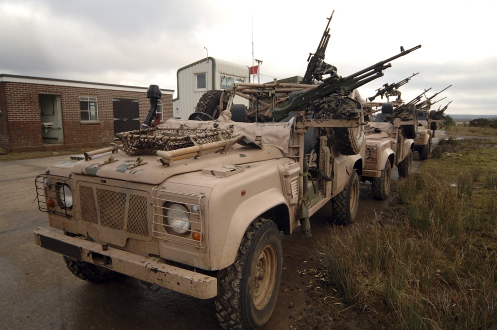 A Pink Panther Land Rover of the British Army Canvas Art - Andrew ChittockStocktrek Images (34 x 23)