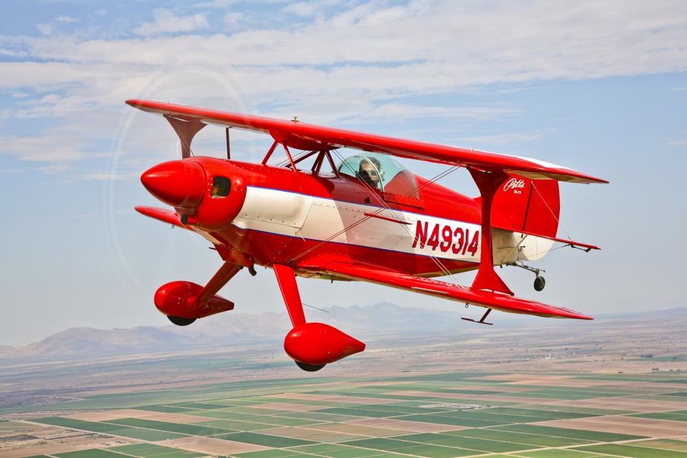 A Pitts Special S-2A aerobatic biplane in flight near Chandler Arizona Canvas Art - Scott GermainStocktrek Images (18 x 12)