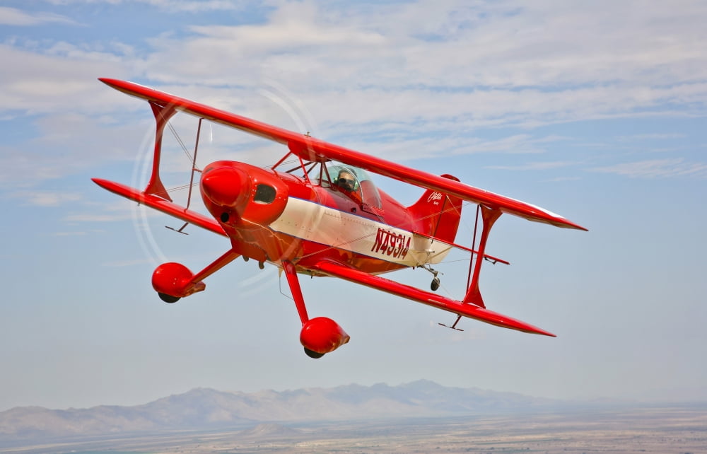 A Pitts Special S-2A aerobatic biplane in flight near Chandler Arizona Canvas Art - Scott GermainStocktrek Images (35 x 23)