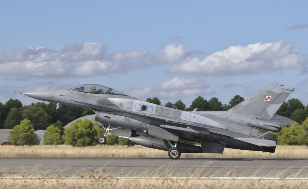 A Polish Air Force F-16 Block 52 at Albacete Air Base Spain Canvas Art - Giovanni CollaStocktrek Images (18 x 11)