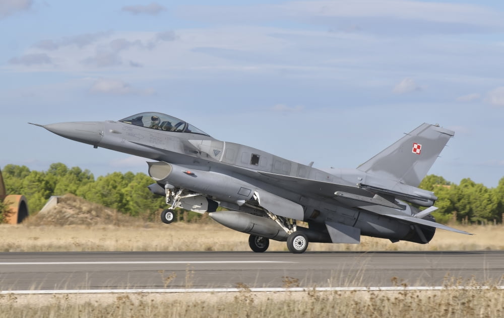 A Polish Air Force F-16 Block 52 at Albacete Air Base Spain Canvas Art - Giovanni CollaStocktrek Images (18 x 11)