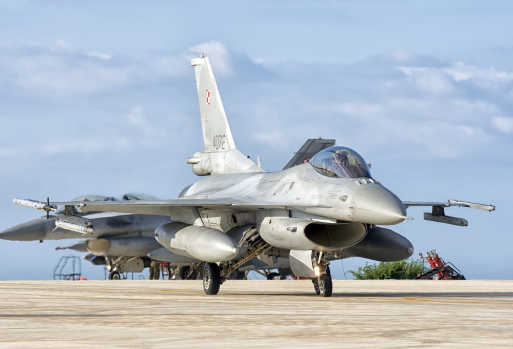 A Polish Air Force F-16 taxiing at Trapani Air Base Italy Canvas Art - Giovanni CollaStocktrek Images (17 x 12)