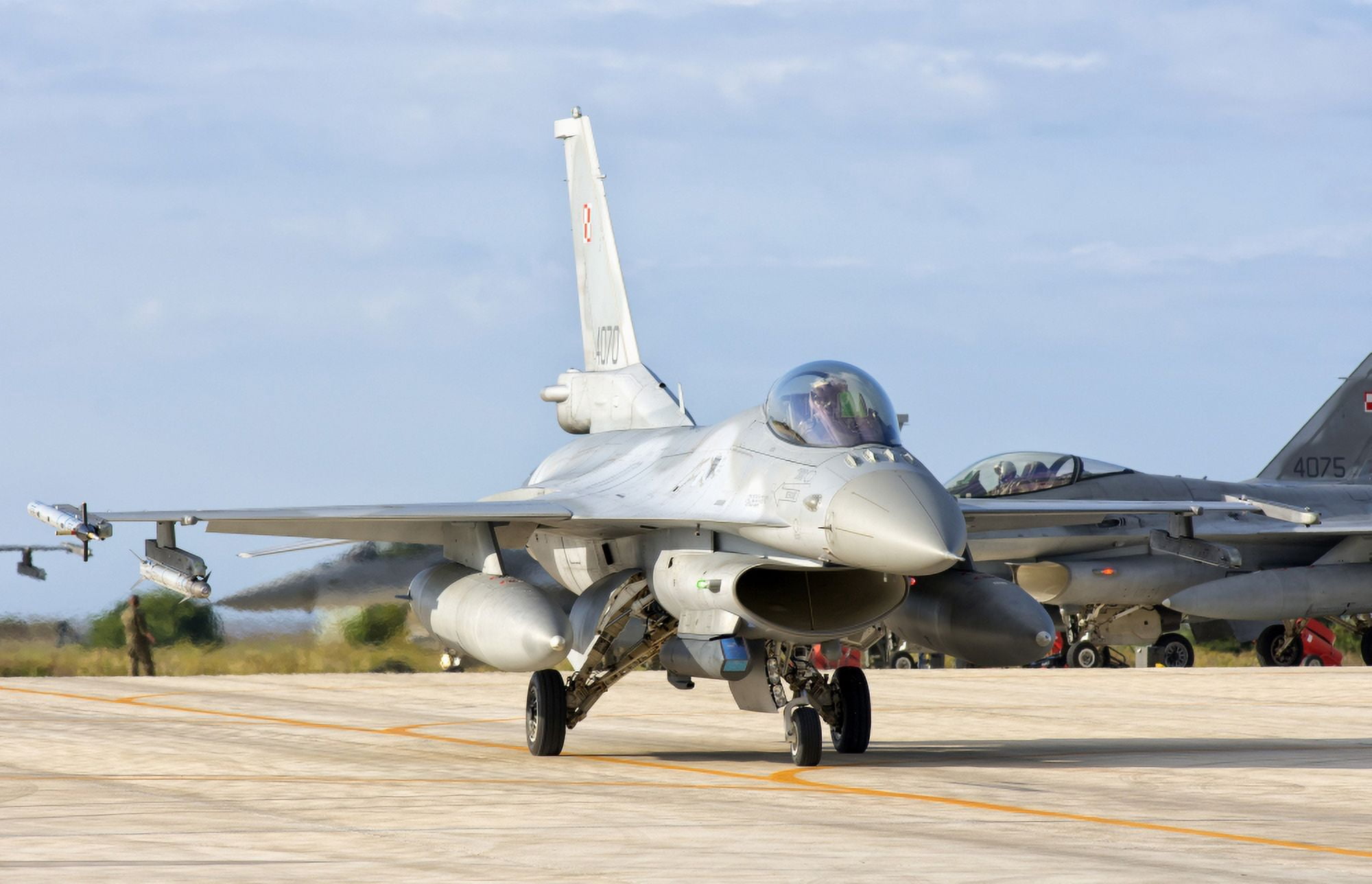 A Polish Air Force F-16 taxiing at Trapani Air Base Italy Canvas Art - Giovanni CollaStocktrek Images (18 x 11)