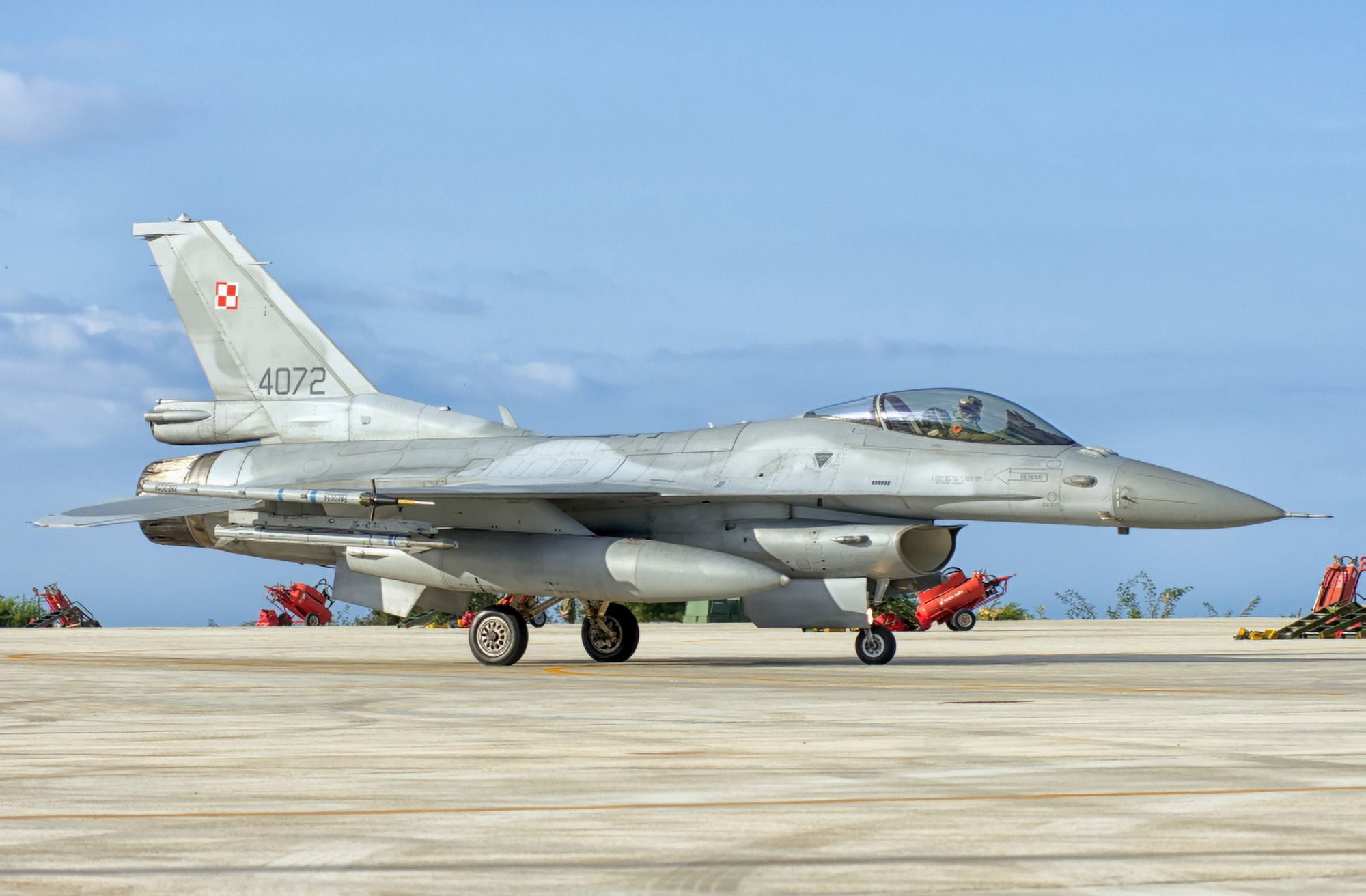 A Polish Air Force F-16 taxiing at Trapani Air Base Italy Canvas Art - Giovanni CollaStocktrek Images (34 x 23)