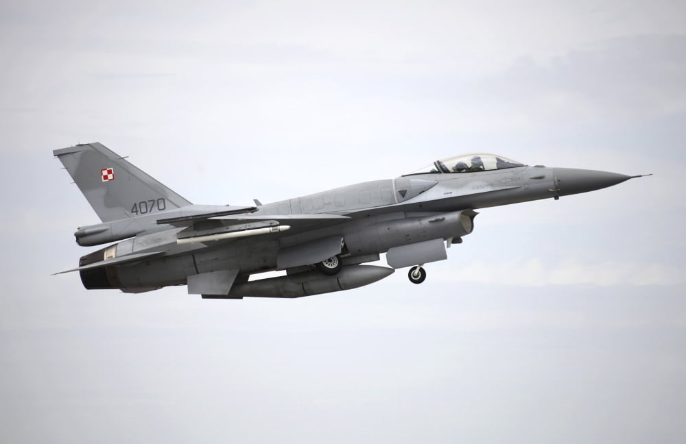 A Polish Air Force F-16C Block 52 in flight over Spain Canvas Art - Timm ZiegenthalerStocktrek Images (18 x 12)