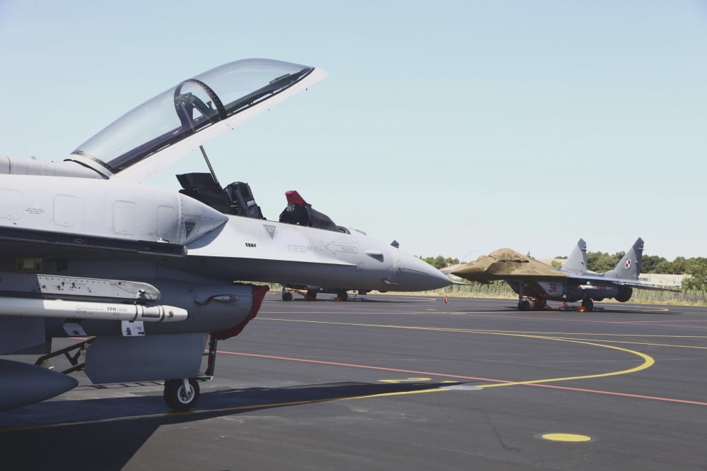 A Polish Air Force F-16D and MiG-29 aircraft Albacete Air Base Spain Canvas Art - Timm ZiegenthalerStocktrek Images (35 x 23)