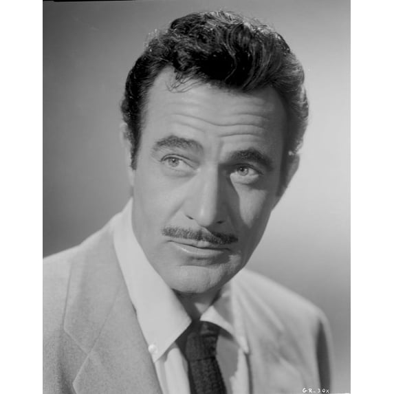 A Portrait Of Gilbert Roland Photo Print (8 x 10)