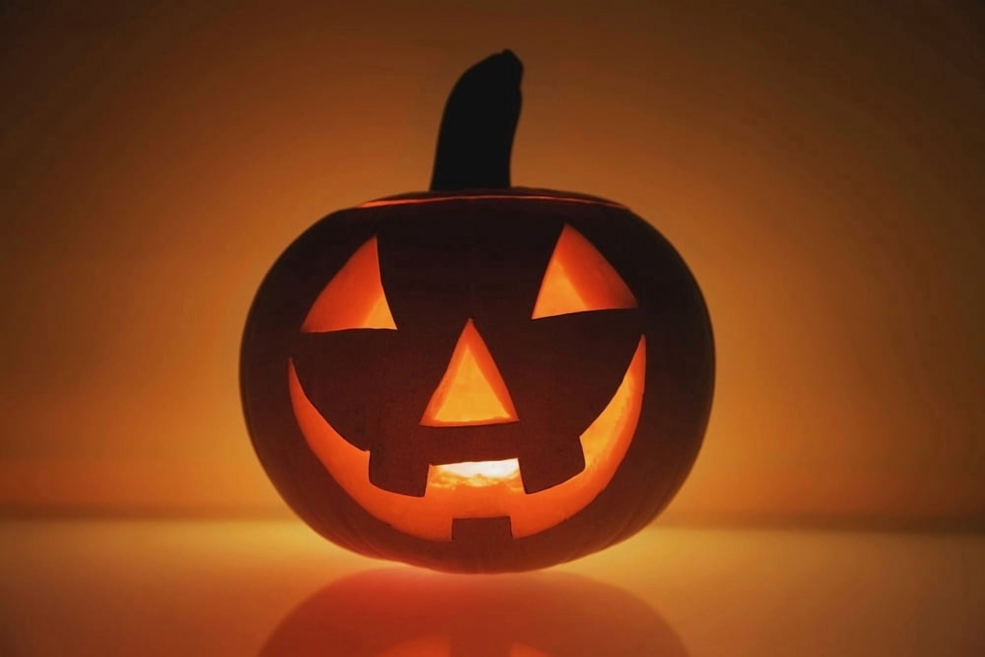 A Pumpkin Carved Into A Happy Face Canvas Art - Patrick Swan Design Pics (19 x 12)