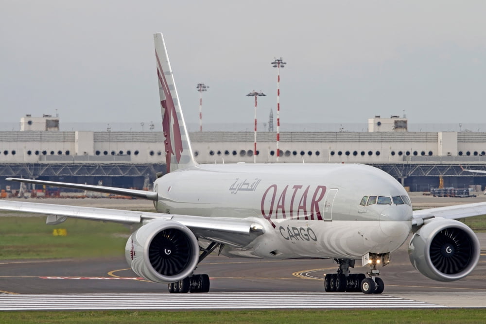 A Qatar Airways Cargo Boeing 777 at Milano Malpensa Airport Italy Canvas Art - Luca NicolottiStocktrek Images (35 x 23)