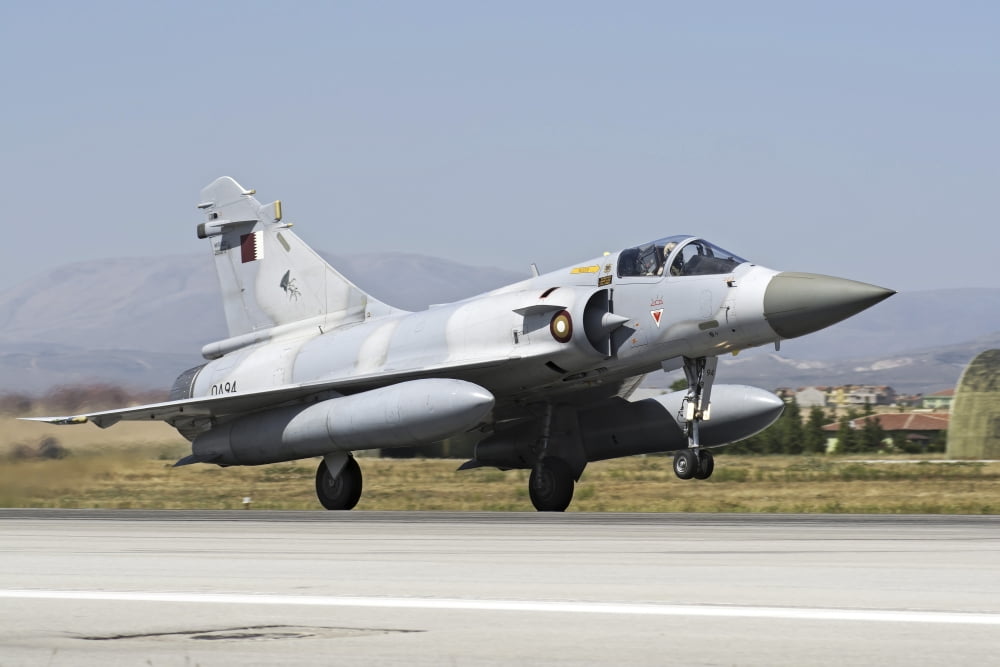 A Qatar Emiri Air Force Mirage 2000-5EDA5DDA on the runway Canvas Art - Daniele FaccioliStocktrek Images (34 x 23)
