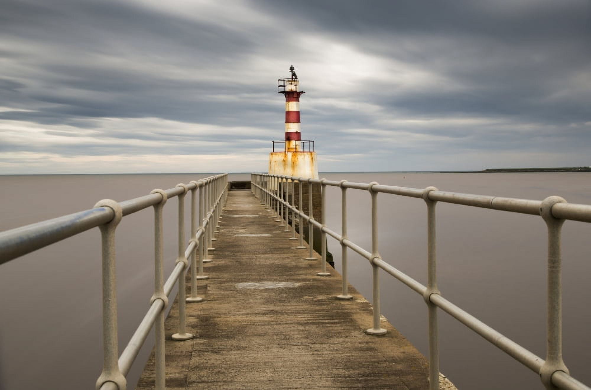 A Red And White Striped Lighthouse At The End Of A Pier Amble Northumberland England Canvas Art - John Short Design Pics (38 x 24)