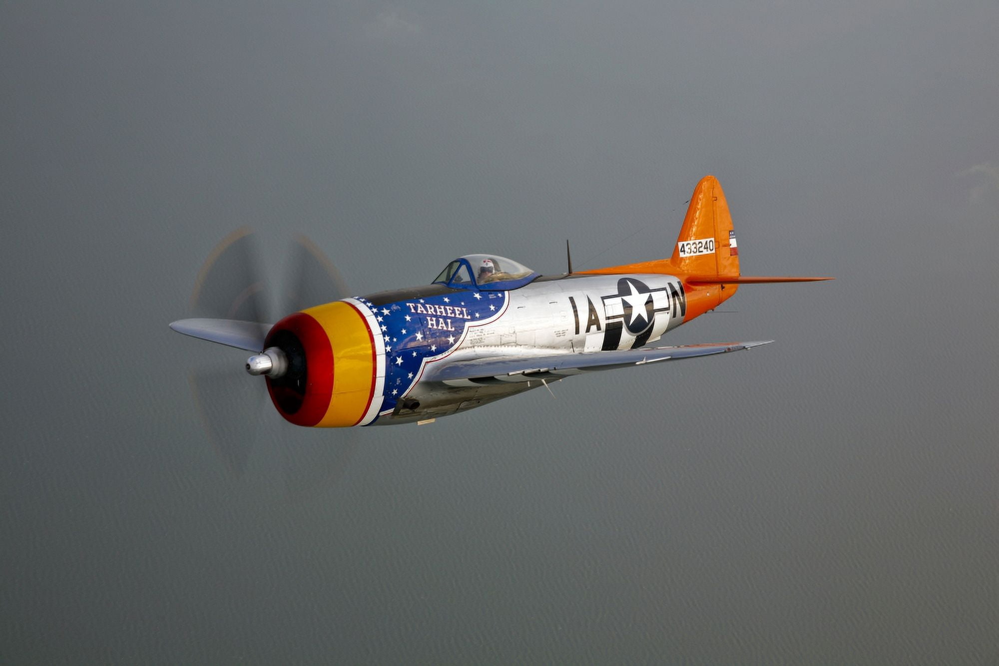 A Republic P-47D Thunderbolt in flight Canvas Art - Scott GermainStocktrek Images (35 x 23)