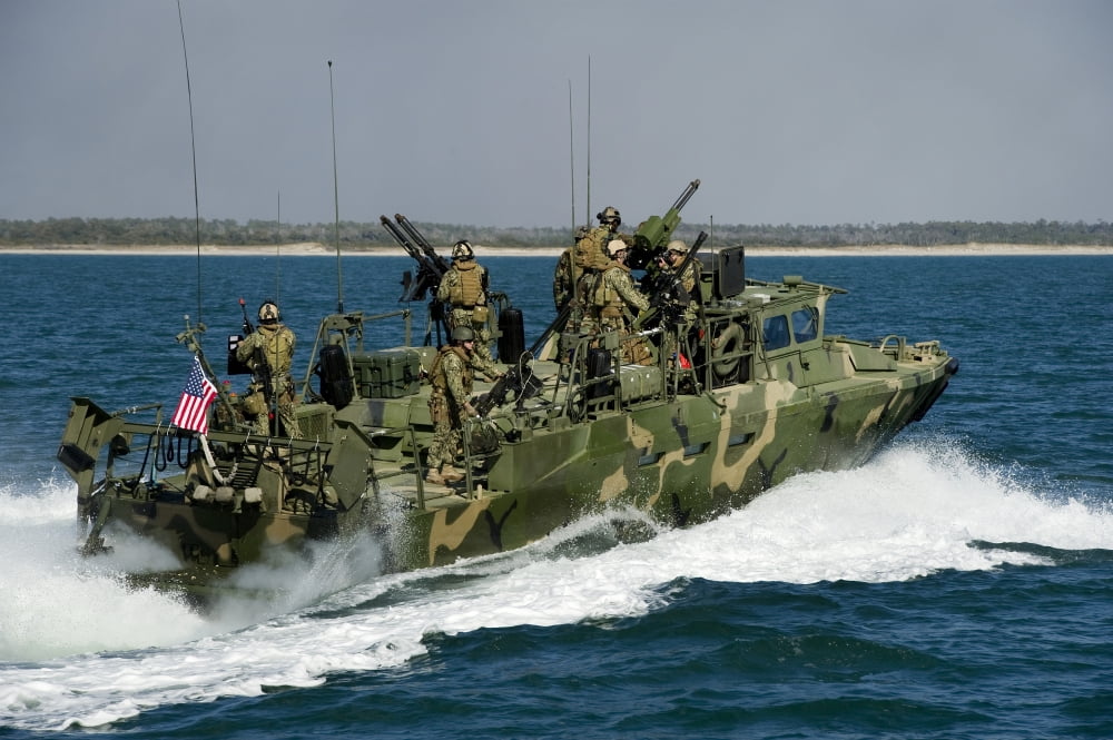 A Riverine Command Boat conducts a route reconnaissance mission Canvas Art - Stocktrek Images (35 x 23)