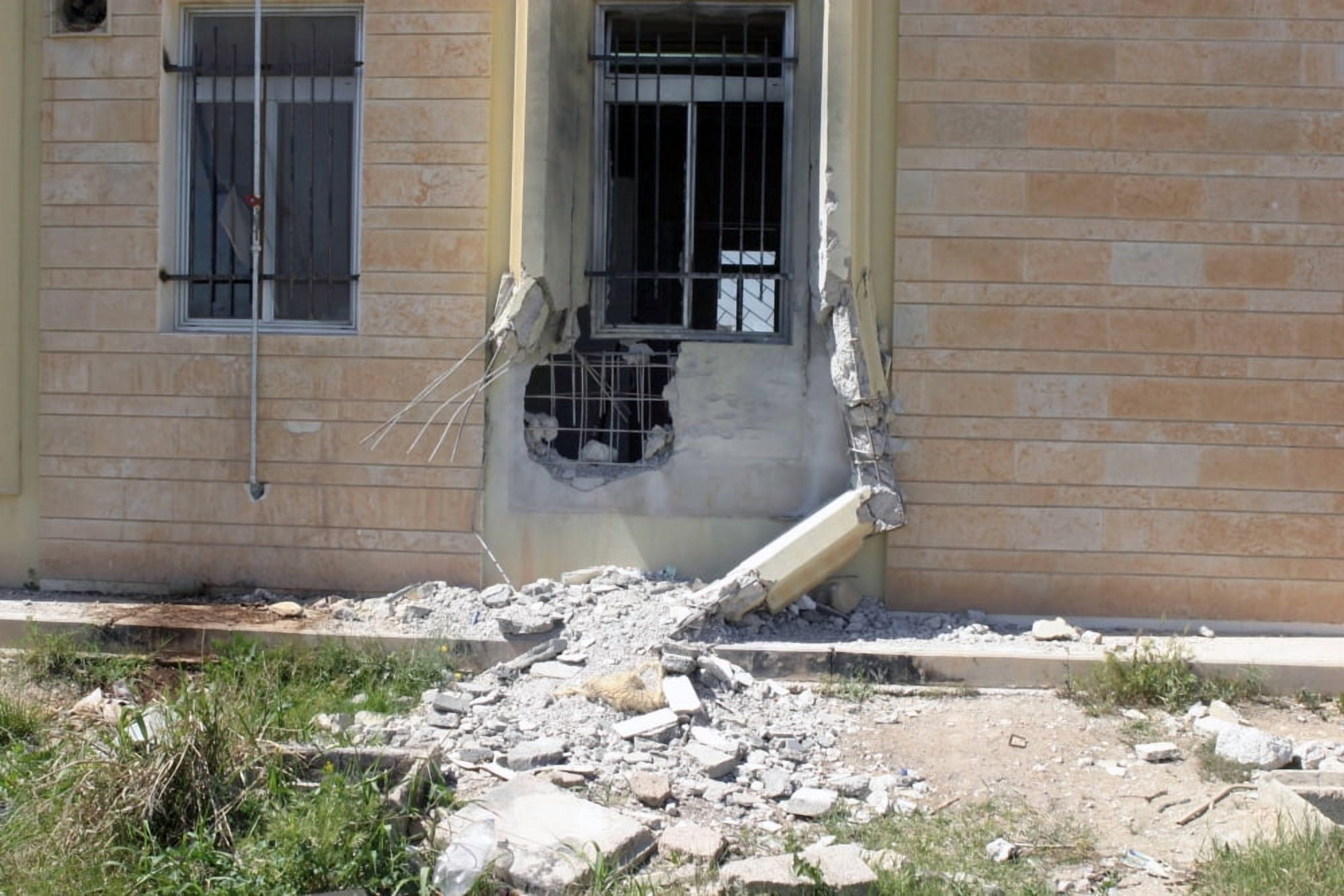 A Rocket Propelled Grenade damaged this portion of the wall Canvas Art - Stocktrek Images (34 x 23)