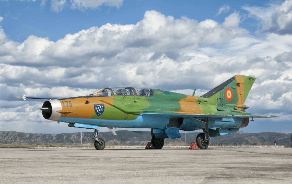 A Romanian Air Force MiG-21B airplane at Camp Turzii Air Base Romania Canvas Art - Giovanni CollaStocktrek Images (18 x 11)