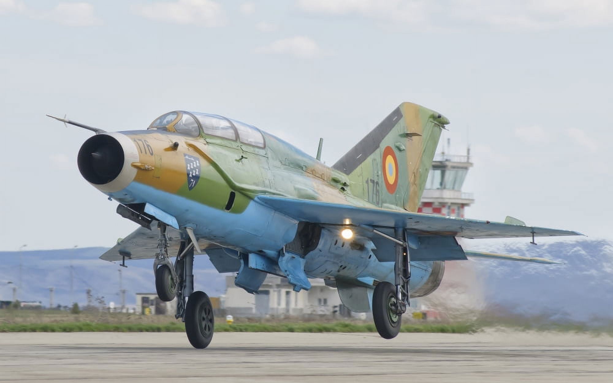 A Romanian Air Force MiG-21B taking off from Camp Turzii Air Base Romania Canvas Art - Giovanni CollaStocktrek Images (35 x 22)